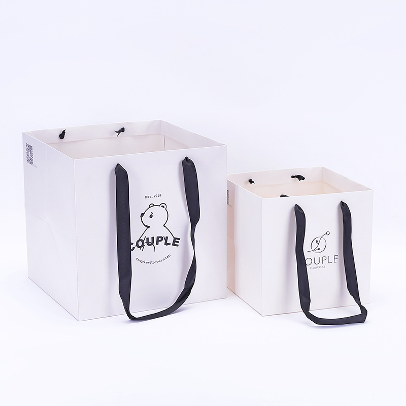 Bespoke Printed Square Floral Thick Paper Carry Bags For Gifts (4).jpg