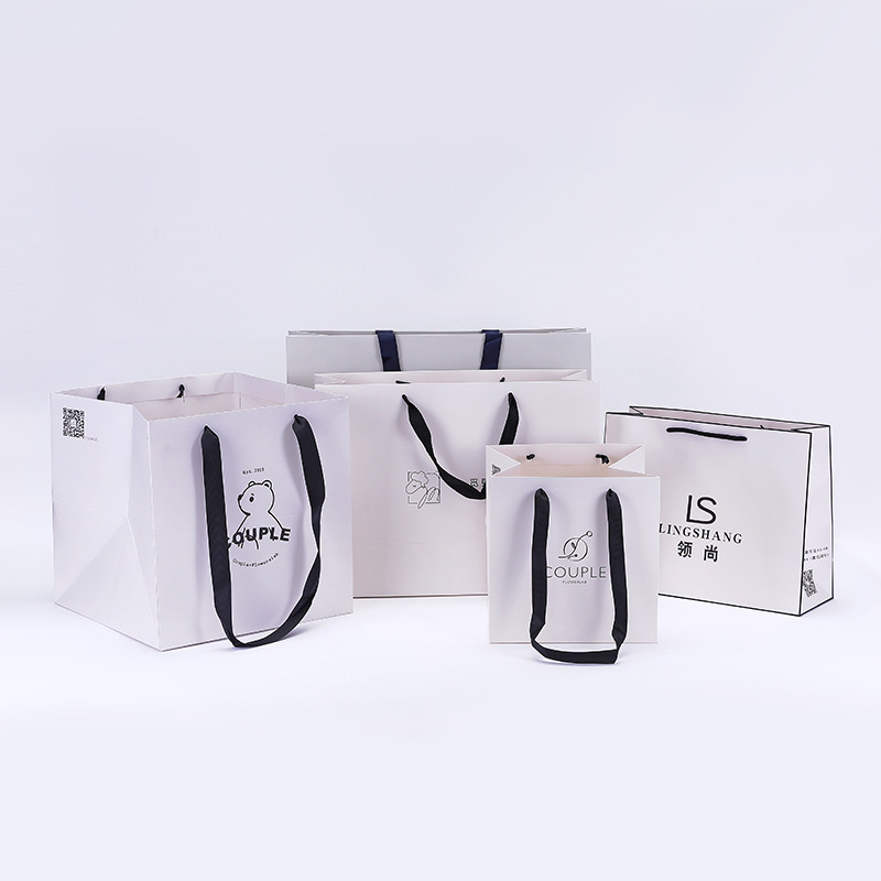 Bespoke Printed Square Floral Thick Paper Carry Bags For Gifts (5).jpg